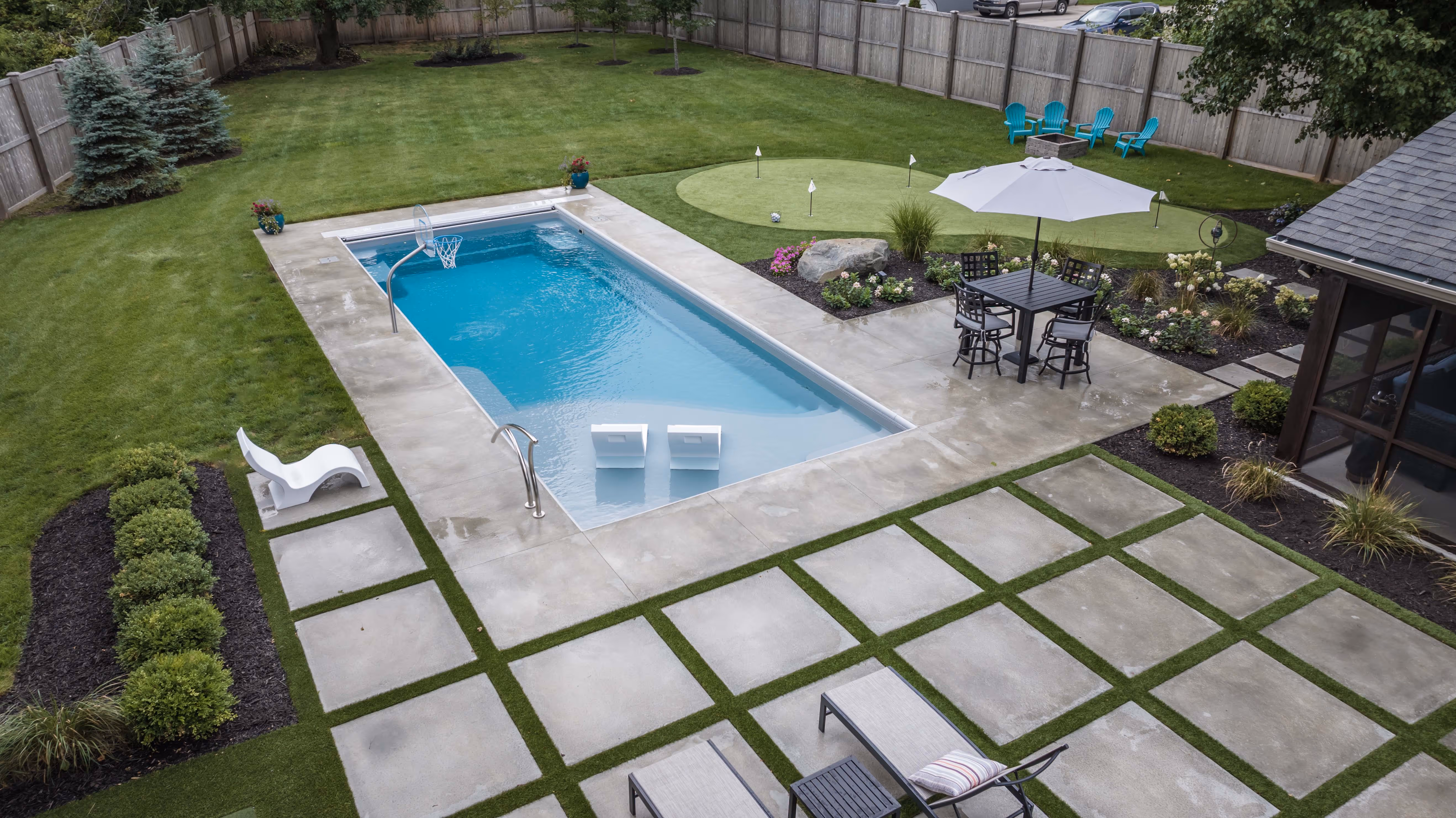 swimming pool with artificial putting green